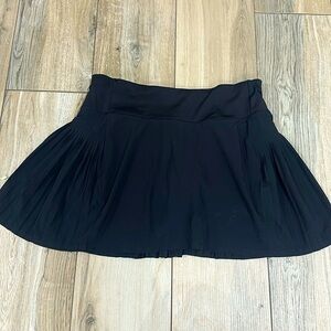 Flat front pleated sides and back athletic skirt